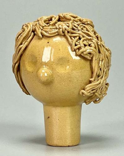 Ceramic Head Sculpture - Doll head or stopper??? by Mary Nohl